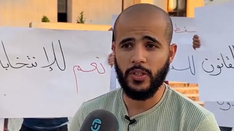 A screengrab taken from a video showing Libyan political activist Al-Moatassim Al-Areebi who was abducted in Misrata, and the United Nations Libya mission (UNSMIL) called on the Libyan authorities to free him and to end arbitrary detentions.