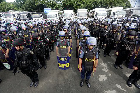 Police officers from the National Capital Region Police Office and the Quezon City Police District attend the send-off at Camp Karingal in Quezon City as part of the preparations for the third State of the Nation Address of President Ferdinand Marcos Jr. on Monday. The NCRPO has augmented at least 2,000 cops for the security of the event.