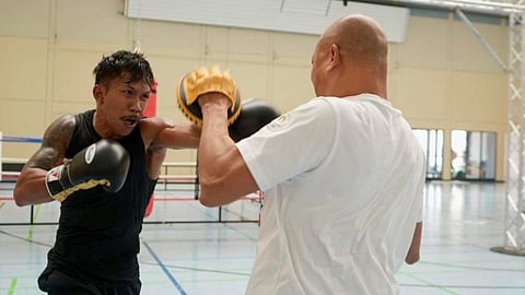 EUMIR Marcial hits the mitts with coach Ronald Chavez in their German training camp in Saarbrücken, Germany.