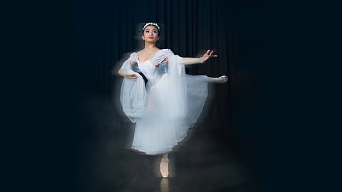 Moonlit Enchantment: The ethereal sylph from Ballet Philippines' La Sylphide weaves her spell
