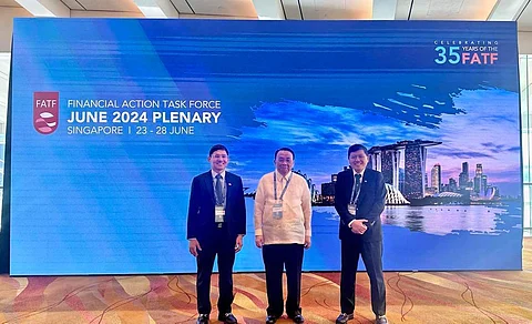 The Philippines reported to the powerful Financial Action Task Force the significant progress it achieved in moving closer to exiting the money-laundering grey list. At the recent FATF meeting are (from left) AMLC executive director Matthew David, Executive Secretary Lucas Bersamin and SEC chairperson Emilio Aquino.