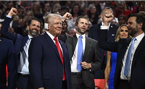 FORMER President Donald Trump (bottom left) smiles as he is cheered on by US Senator from Ohio and 2024 Republican vice-presidential candidate J. D. Vance (right) and his sons Donald Trump Jr. and Eric Trump during the first day of the 2024 Republican National Convention at the Fiserv Forum in Milwaukee, Wisconsin, on 15 July.