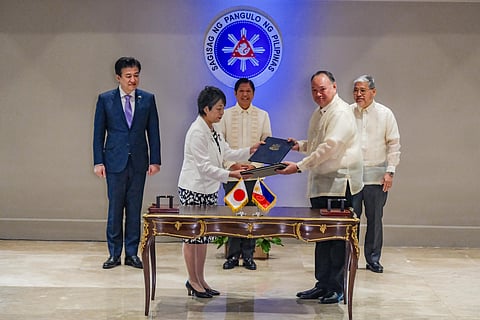 JAPAN Foreign Minister Kamikawa Yoko and Defense Secretary Gilberto Teodoro Jr. exchange copies of the Reciprocal Access Agreement they signed for Tokyo and Manila on Monday in a Palace ceremony witnessed by President Ferdinand Marcos Jr., Japanese Defense Minister Kihara Minoru and Foreign Affairs Secretary Enrique Manalo.