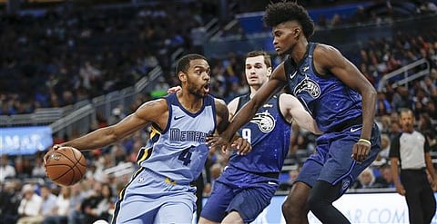 Former Memphis Grizzlies player Myke Henry (left) is on his way to NLEX in the PBA.