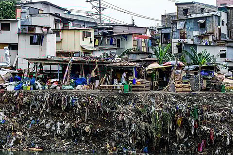 Tons of trash are being cleared out along the banks covering Barangay Damayang Lagi and Barangay Doña Imelda in Quezon City following the onslaught of typhoon ‘Carina’ which submerged most Metro Manila cities on Wednesday.