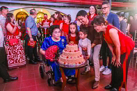 FORMER First Lady Imelda Marcos blows out her birthday cake at a gathering organized at their house in San Juan on Wednesday. Joining the celebration are Senator Imee Marcos, celebrities Ruffa Gutierrez, Cristine Reyes, Cesar Montano, Daryll Yap, Pinky Amador, Diego Loyzaga and Ella Cruz, among others.