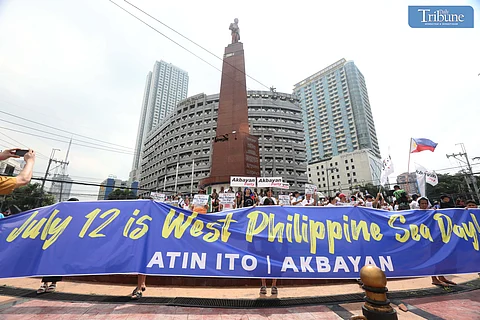 (FILES) On Friday July 12, 2024, activists and progressive groups led by the Atin Ito WPS Coalition and Akbayan Youth held protest at the Boy Scout Circle in Quezon City to commemorate the Philippines' 8th anniversary of victory over China at the Permanent Court of Arbitration in Hague. Calling for the annual declaration of July 12 as West Philippine Sea Day, while condemning the ongoing harassment of Philippine resupply vessels in its exclusive economic zone.