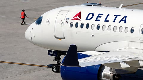 A Delta Air Lines jet leaves the gate, July 19, 2024, at Logan International Airport in Boston.