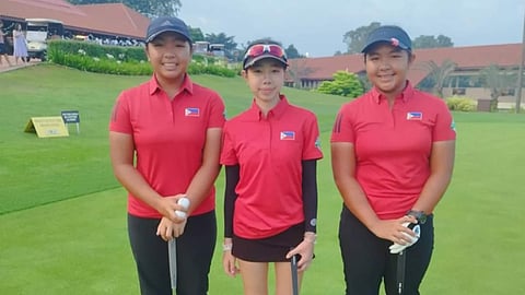 THE country’s spunky junior golfers (from left) Mona Sarines, Nicole Gan and Lisa Sarines got a ‘big-girl education’ in Singapore.