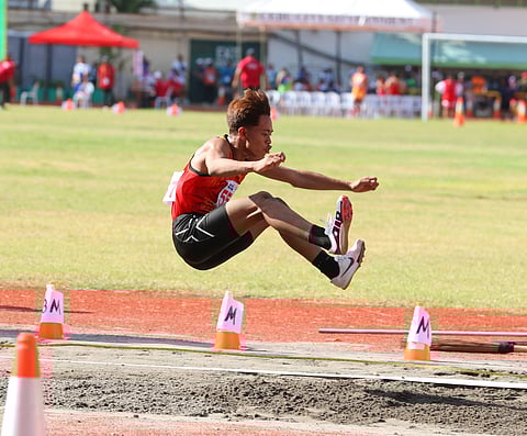 JYANE Kirk Cantor soars with a record-breaking 6.14 meters to win the gold medal in the elementary boys’ long jump event of the 64th Palarong Pambansa on Thursday at the Cebu City Sports Center.