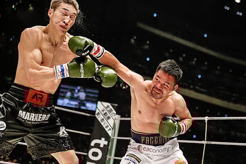 MANNY Pacquiao destroys Rukiya Anpo of Japan in their three-round exhibition match over the weekend in Tokyo.