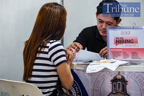 Jobseekers line up for an initial interview during a job fair of the Manila LGU at Park 'N Ride, Lawton, Manila on Tuesday, July 09, 2024. The unemployment rate in the Philippines dropped to 4.1% in May 2024, down from 4.3% the previous year, with 2.11 million Filipinos jobless. Despite this improvement, there was an increase of 65,000 unemployed individuals from April to May 2024. The number of employed persons rose by 605,000 year-over-year to 48.87 million, boosting the employment rate to 95.9%. Underemployment also saw a significant decline, with the rate falling from 11.7% to 9.9%, indicating better employment conditions for workers. PHOTOS BY YUMMIE DINGDING