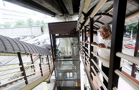 Department of Transportation Secretary Jaime Bautista inspects the EDSA-Philam Busway Station on Monday. The agency also opened the rehabilitated footbridge and the elevators that will assist pregnant women, senior citizens and persons with disabilities.