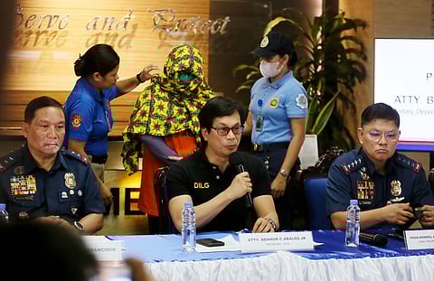 Department of the Interior and Local Government Secretary Benhur Abalos introduces to the media Paulene Canada, a co-accused of Kingdom of Jesus Christ founder Pastor Apollo Quiboloy. With Abalos are Philippine National Police Chief Dir. Gen. Rommel Francisco Marbil and Criminal Investigation and Detection Group Chief Leo Francisco, and Davao Region Police Director PBGen Nicolas Torre, at the PNP Headquarters in Camp Crame, Quezon City, on Friday. Canada has a bounty on her head worth P1 million and is the No. 6 most wanted in the Davao region.