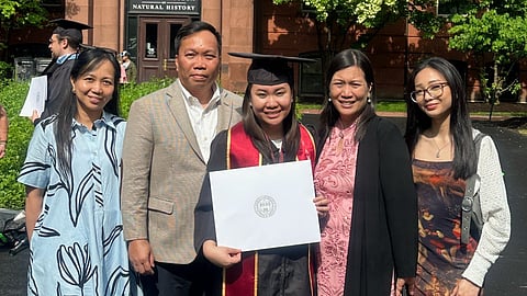 A HARVARD graduate in the family. Flanking Meg Jiliane Frias are (from left) aunt Shiela Mae Frias, father Giovanni, mother Elizabeth and niece Guerlain Twain.