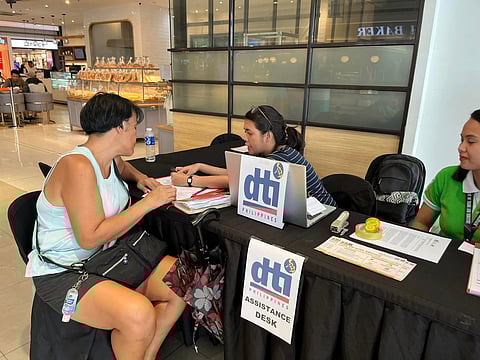 STAFF from the DTI assist business owners.