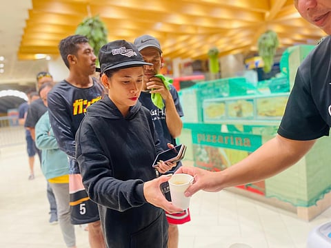 SM City Marikina offered hot meals to people taking shelter from rising floodwaters.