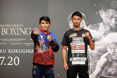 Filipino challenger Vincent Astrolabio (left) and defending champion Junto Nakatani size each other up during Thursday’s press conference in Tokyo, the site of their WBC bantamweight title match slated Saturday at the Ryogoku Kokugikan Sumo Arena.