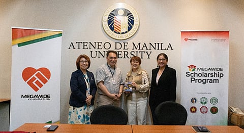 ATENEO de Manila University and Megawide Corporate Foundation Inc. officials pose during the signing of the memorandum of agreement on student financial support program. They are (from left) ADMU vice president for Higher Education Dr. Maria Luz Vilches; ADMU Office of Administration director Dr. Jose Maria Tirol; MCFI executive director Tata Saavedra; and MCFI consultant Atty. Mia Castro.