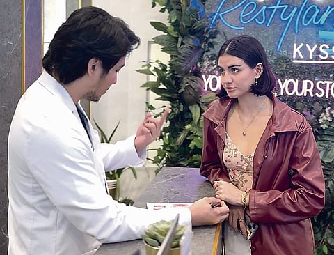 Dr. Christian Peralta of Belleza Aesthetics and Rayana Eissa.