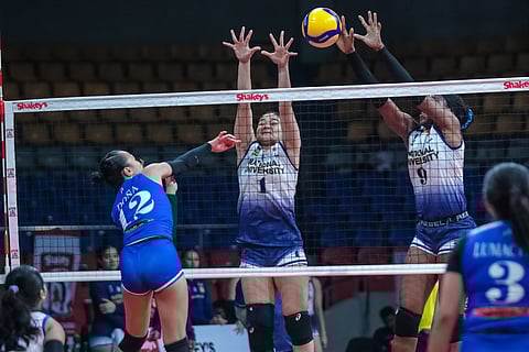 KAYE Bombita (left) and Aishat Bello of NU shut the door on Kristina Dona of Xavier University during their SSL National Invitationals match on Friday. The Lady Bulldogs prevailed, 25-15, 25-13, 25-13.