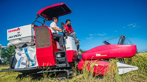 President Ferdinand Romualdez Marcos Jr. operating a rice combine harvester