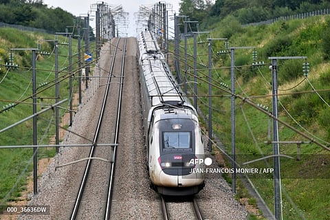 A high-speed train by French railway company SNCF travels on the Bordeaux-Paris route at reduced speed, at Chartres, northern France on July 26, 2024, after the resumption of high speed train services on the line between Paris and Bordeaux, following suspected acts of sabotage on the country's rail network ahead of the opening ceremony of the 2024 Paris Olympic Games. France's rail network was paralyzed by coordinated acts of sabotage which knocked out most of its high-speed train services hours before the Paris Olympics opening ceremony. French rail operator SNCF said three night-time arson attacks had destroyed cabling boxes at strategic junctions around its network at locations north, south-west and east of Paris.