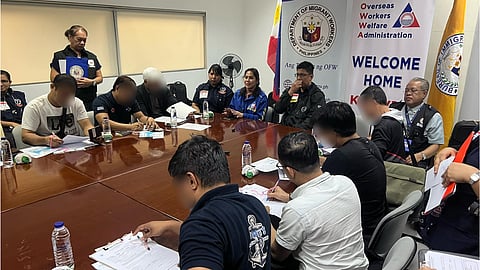 TEN Filipino crew members of M/V Transworld Navigator fill out assistance forms after arriving at the NAIA Terminal 3 in Pasay City on Tuesday via Cathay Pacific Flight CX 903. They compose the second batch of 27 Filipino seafarers set for repatriation after their vessel was recently attacked by Houthi rebels in Yemen while traversing the Red Sea. The repatriated seafarers received immediate assistance from the government and were assured of sustained support, in coordination with their licensed manning agencies.