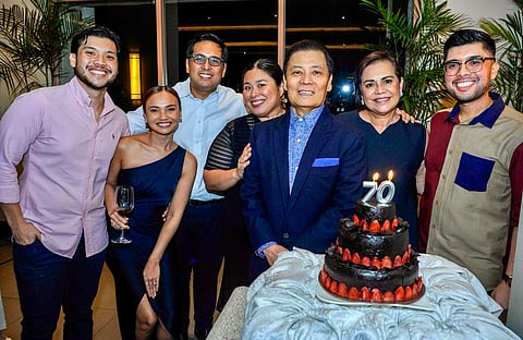 BIRTHDAY celebrator Rene Puno (fifth from left) and wife Ann Puno and their family.