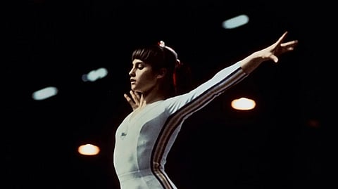 Nadia Comaneci at the 1976 Montreal Olympics - From teenage prodigy to enduring sports icon.