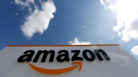 FILE PHOTO: The logo of Amazon is seen at the company logistics center in Boves, France, May 13, 2019.