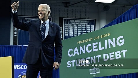 US President Joe Biden gestures after speaking about student loan debt relief at Madison Area Technical College in Madison, Wisconsin, April 8, 2024.