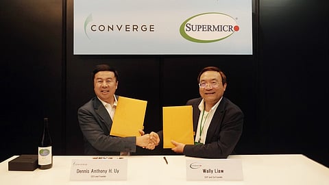 Converge CEO and co-founder Dennis Anthony Uy (left) seals the partnership through a handshake with Wally Liaw, co-founder and senior vice president of Supermicro in Taiwan.