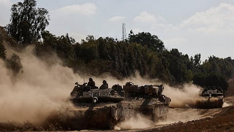 A convoy manoeuvres near the Israel-Gaza border, amid the Israel-Hamas conflict, in Israel, 1 July 2024.