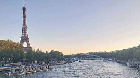 High water levels and strong currents in the River Seine near the Eiffel Tower on the evening of Sunday 28 July 2024.