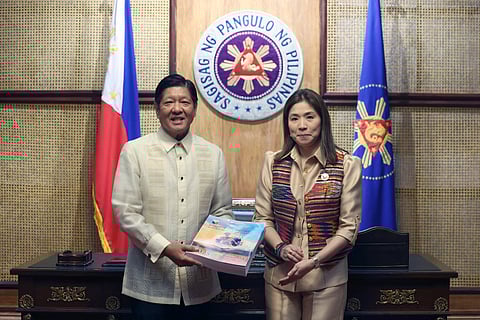 PRESIDENT Ferdinand Marcos Jr. receives a copy of the New Expenditure Policy 2025 from Budget Secretary Amenah Pangandaman at the Malacañang Palace on Wednesday.