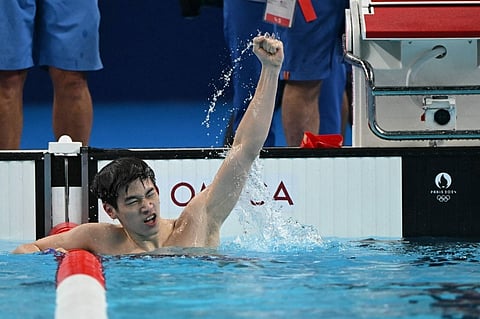 China's Pan Zhanle reacts after winning gold in the men's 100-meter freestyle event at the Paris Olympics on Wednesday.