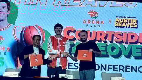 Los Angeles Lakers guard Austin Reaves (middle) strikes a pose with Arena Plus executive Rafael Jasper Vicencio and the player’s agent Aaron Matthew Reilly during a sponsorship event Saturday at the Shangri-La The Fort in Taguig.