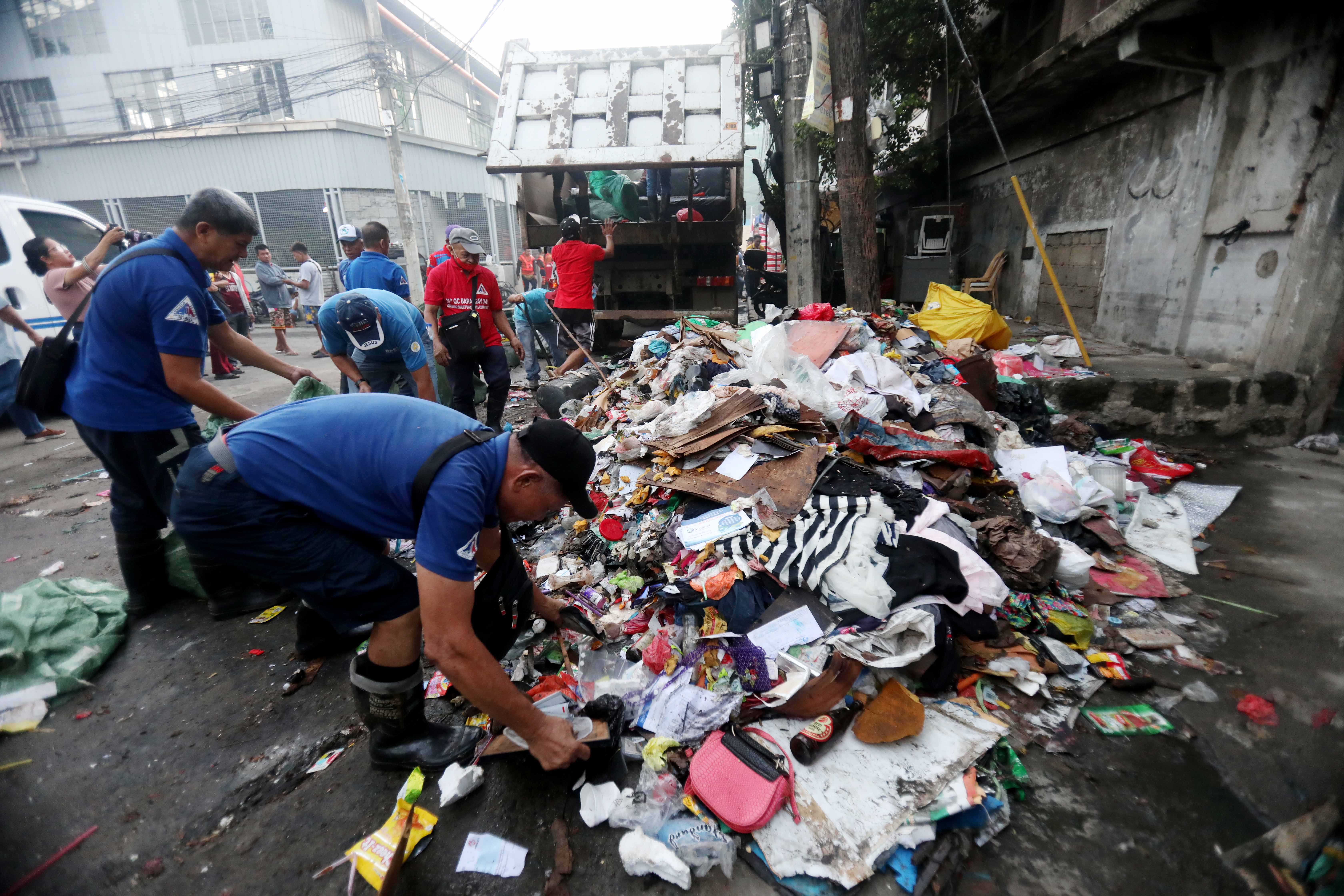 BARANGAY Tinajeros in Malabon City gets a massive cleanup effort from the Department of the Interior and Local Government and Metropolitan Manila Development Authority Saturday as part of the President’s Kalinisan Project for areas hardest hit by super typhoon ‘Carina.’