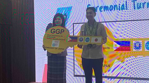 Japan Embassy Second Secretary Tokiko Nishimura hands over the symbolic key of the portable X-ray machine to Olongapo City Mayor Rolen Paulino Jr. on Thursday in Olongapo City Hall.