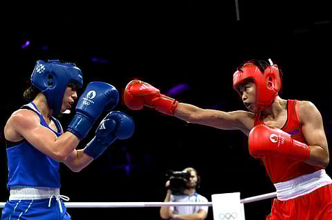 AIRA Villegas (right) beats Roumaysa Boualam of Algeria in the Round of 16 of the women’s 50-kilogram event of the Paris Olympics.
