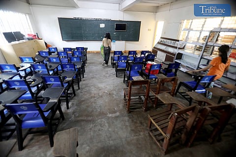 Parents and students helped teachers prepare classrooms at Betty Go Belmonte Elementary School in Quezon City on Saturday, 3 July 2024. The school opening was postponed to August 5 to allow cleanup and rehabilitation after Super Typhoon Carina.