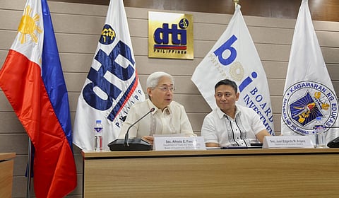 Outgoing DTI Secretary Alfredo Pascual (left) with DepEd Secretary Juan Edgardo ‘Sonny’ Angara.