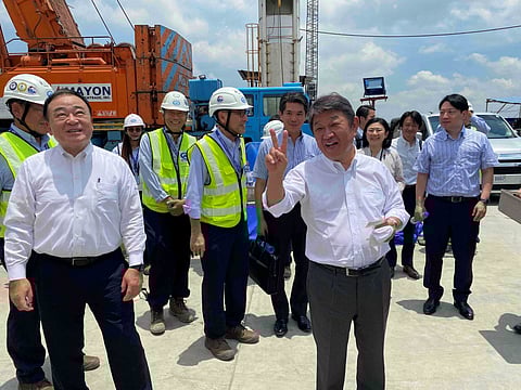 Peace dividend Toshimitsu Motegi, secretary general of Japan’s Liberal Democratic Party (center, flashing peace sign), with Japanese Embassy staff and officials visit the Metro Manila Subway project which is being constructed with Japanese financing.