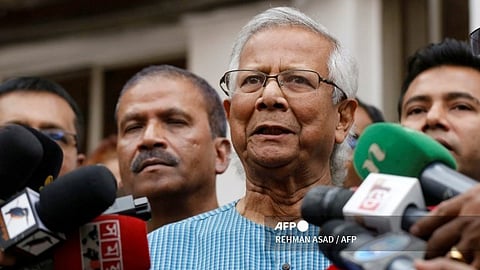 (FILES) Bangladeshi Nobel peace laureate Muhammad Yunus (2R) addresses the media as he prepares to leave after filing an appeal for the extension of his bail at Labour Appellate Tribunal in Dhaka on March 3, 2024. Student leaders in Bangladesh on August 5, demanded Nobel winner Muhammad Yunus lead a caretaker government, a day after the military took control as mass demonstrations forced longtime ruler Sheikh Hasina to flee the country.