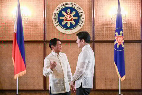 PRESIDENT Ferdinand R. Marcos Jr. engages in conversation with Career Executive Service chairman Carlos Nograles during the oathtaking ceremony for 146 newly appointed CES officers and the conferment of the Gawad CES to four distinguished awardees at Malacañang Palace in Manila on Monday, 5 August.