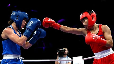 AIRA Villegas (right) beats Roumaysa Boualam of Algeria in the Round of 16 of the women’s 50-kilogram event of the Paris Olympics.