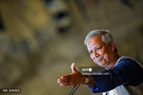 (FILES) Bangladeshi Nobel Peace Prize winner and microcredit pioneer Muhammad Yunus gestures as he delivers a lecture entitled "Social businness: sustainable solutions to the most pressing social challenges " at Italy's Chamber of Deputies on July 10, 2014. Student leaders in Bangladesh on August 5, 2024, demanded Nobel winner Muhammad Yunus lead a caretaker government, a day after the military took control as mass demonstrations forced longtime ruler Sheikh Hasina to flee the country.