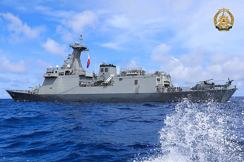 The HMCS Montreal (FFH336) and its Sikorsky CH148 Cyclone during the AUS-CAN-PH-US Multilateral Maritime Cooperative Activity being held in the West Philippine Sea from 7 to 8 August