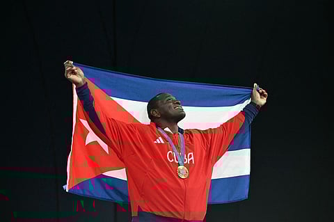 MIJAIN Lopez Nunez of Cuba celebrates after winning his fifth Olympic medal in the Paris Olympics.